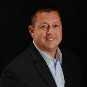 Headshot of founder Scott Adamonis.